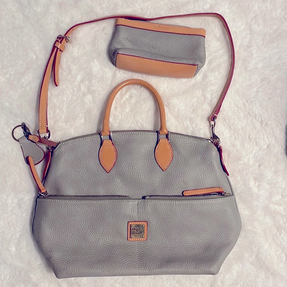 Dooney and Bourke, gray shoulder bag with keychain and accessory pouch.